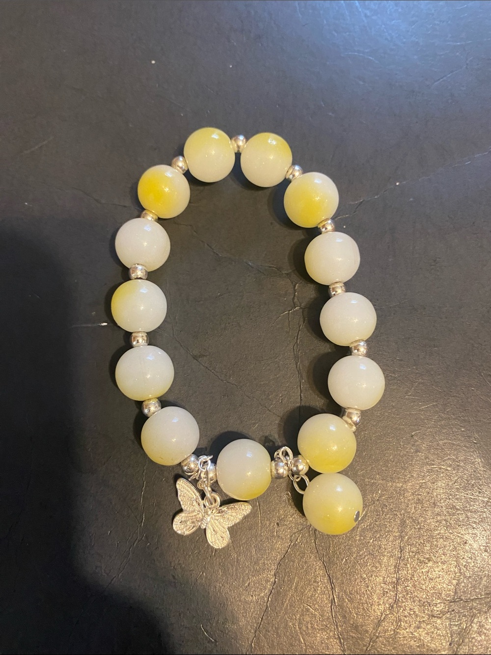 Yellow and White Beaded Bracelet with Butterfly Charm